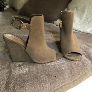 Schutz brown suede slides.